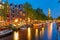 Night Amsterdam canal and Westerkerk church