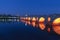 Night andIilluminated Image of Meric Bridge