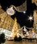 Night Atmospheric View, Motion Blurred of Graben, Busy Crowded Vienna`s Shopping Street with Memorial Plague Column Pestsaule