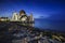 Night and blue hour scene of beautiful Malacca Straits Moqsue.