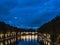 Night on bridge Giuseppe Mazzini and the Fiume Tevere river in Rome Italy