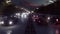 Night cars lights and heavy traffic. Cars with headlights on go to the city at night. 3D Rendering