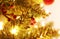 Night Christmas tree with decorative ornaments and golden lights