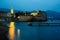 Night city, ancient walls at twilight, medieval walled city and sea. Old Town of Budva, Montenegro.