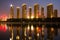 Night city; buildings\\\' reflection on the water. Affiliated Hospital