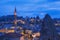 night city of Goreme, Cappadocia Turkey, overlooking the minaret and houses in the rocks, .blue hour