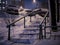 Night city snowy ladder at winter