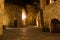 Night on the city square of medieval Gimignano. Tuscany, Italy