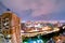 Night cityscape of noida with skyscraper, monsoon clouds and moo