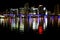 Night colorful Miami, Florida beautiful skyline cityscape view bright lights water ocean reflection