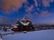 Night countryside hills, groves and farmlands in winter remote alpine mountain village. Ukraine, Voronenko