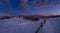 Night countryside hills, groves and farmlands in winter remote alpine mountain village. Ukraine, Voronenko