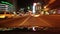 Night driving time lapse, cars leave traces with lights, city