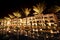 Night Dubai street with palms and pool