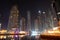 The night illumination at Dubai Marina and Cayan Tower