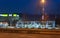 Night image of MOL gas or petrol station with film grain.