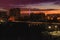 Night landscape of bridge aqueduct on the backround of Worker and collective farmer with the Ostankino tower at sunset