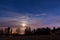 Night landscape and cloudy starry sky