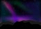 Night landscape with colorful Aurora and purple light at mountains. Starry sky with hills in summer