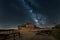 Night landscape with colorful milky way over Church of Santa Maria de Melque located in toledo spain. Starry sky with hills at sum