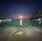 Night landscape at the seashore with stone and lunar path