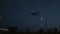 Night Landscape. Shot. Passenger plane over night sea. Plane is landing at night over the sea