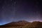 Night landscape of the Teide volcano, with the Polar star in the background, marking a circle by the movement of the earth,