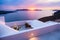 Night lights at sunset in Santorini island, Greece. White architecture with sea view