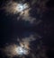 Night lunar landscape with clouds reflection in water