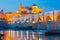 Night Mezquita and Roman bridge in Cordoba, Spain