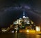 Night Mont Saint-Michel and Milky Way in sky, France