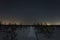 Night nature scene of Estonia in winter. Walking wooden path in the viru swamp