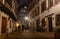 Night old city cobblestones lonely passers