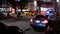 Night outdoor shot of red and blue emergency lights of police car