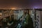 Night panorama of Light in the windows of a multistory building. life in a big city