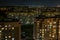 Night panorama of Light in the windows of a multistory building. life in a big city