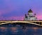 Night panoramic view of Moscow Christ the Savior Cathedral, Bolshoy Kamenny Bridge, Moskva river with pleasure boats and embankmen