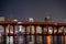 Night photo bridge blocking view of Downtown Miami FL