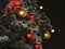 Night photo, decorated Christmas tree hanging colorful balls