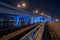 Night photo Downtown Miami port boulevard bridge lit neon electric blue