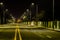 Night photo of empty four lane street