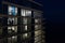 Night photo highrise tower view of interior apartments