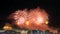 Night photo of New Year\'s arrival (RÃ©veillon) with fireworks in the sky