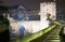 Night photo of old medieval stone bridge with gate. Besalu