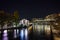 Night photo of RhÐ¾ne River and city of Geneva