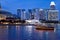 Night photo of Singapore boat tour at the Singapore river in Esp