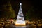 Night photography of bright white Christmas tree lights at King street wharf, Darling harbour.