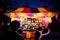 Night photography of Colourful Game booth winning prizes for dolls at community fun fair, Parramatta park.