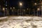 Night picture of a basketball field in the courtyard in Moscow
