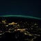 Night planet earth with the lights of megalopolis cities at night and the northern lights. Europe and the cities of Italy, France